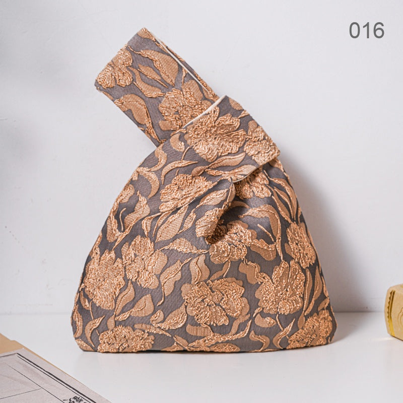 016 Bronze Bloom Japanese knot wrist bag
