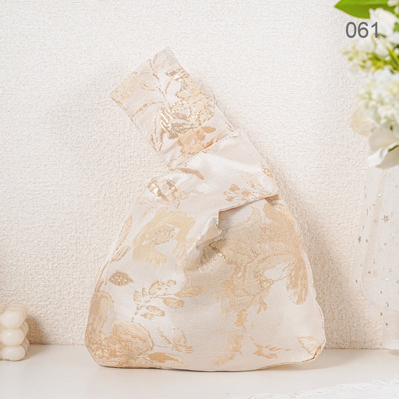 061 Gold Gilded Leaf Japanese knot wrist bag