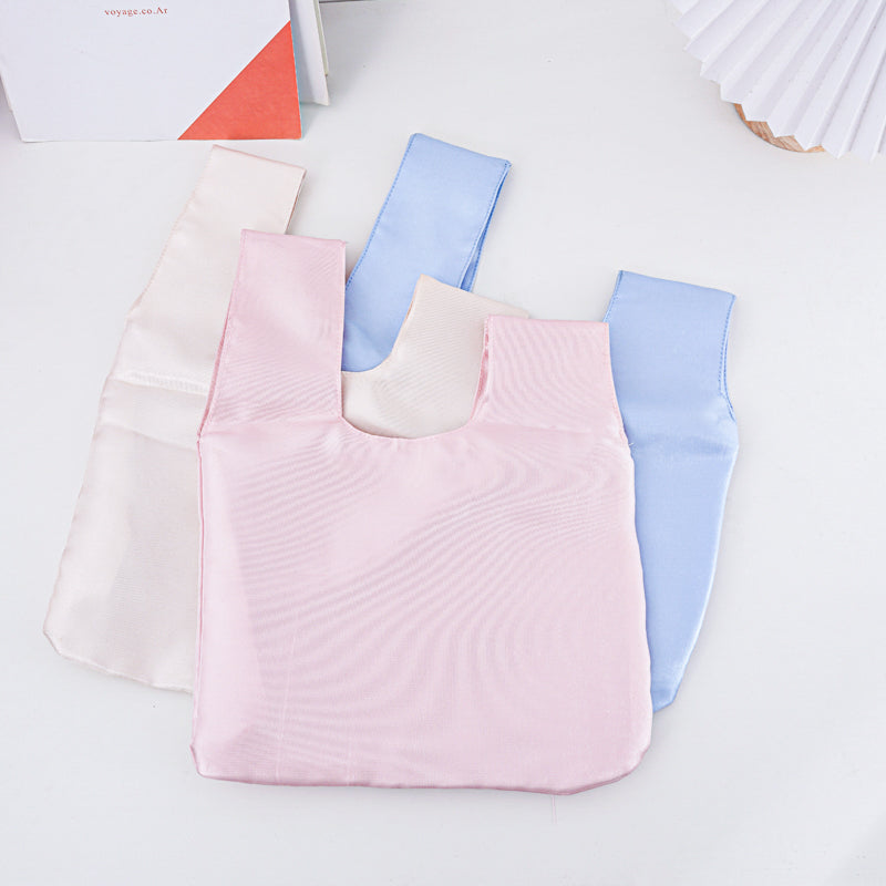 Elegant Solid Color Satin Wedding Favor Knot Bag - flatlay view