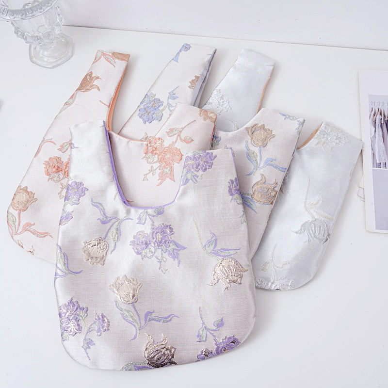 Luxurious Silver Phalaenopsis Brocade Wedding Favor Knot Bag - flatlay view