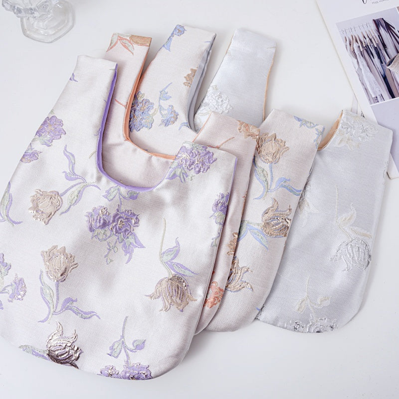 Luxurious Silver Phalaenopsis Brocade Wedding Favor Knot Bag - flatlay view
