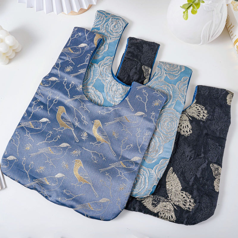 Whimsical Butterfly & Bird Floral Brocade Wedding Favor Knot Bag - flatlay view