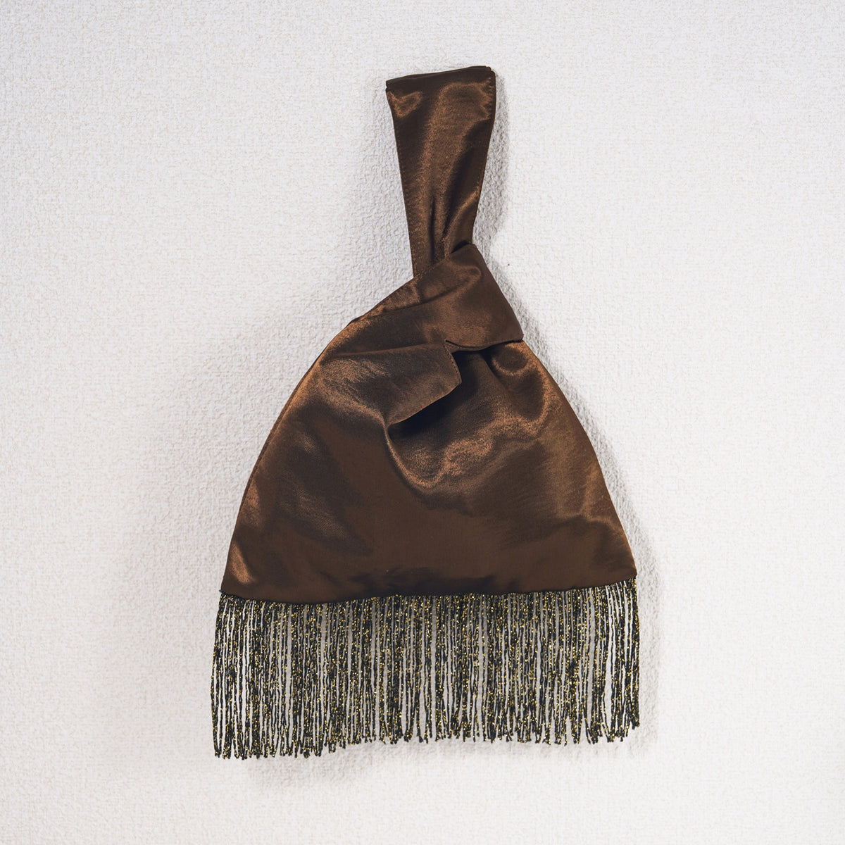 Coffee brown acetate satin Japanese knot bag with gold metallic fringe