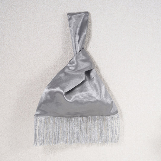 Silver acetate satin Japanese knot bag with silver metallic fringe