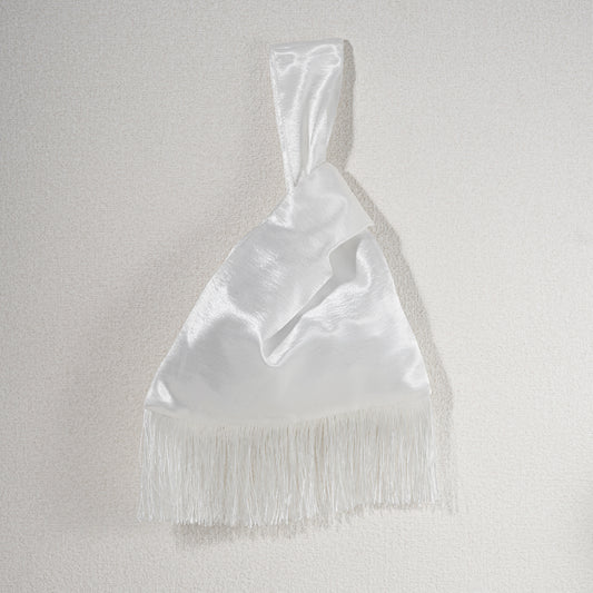 White acetate satin Japanese knot bag with white fringe