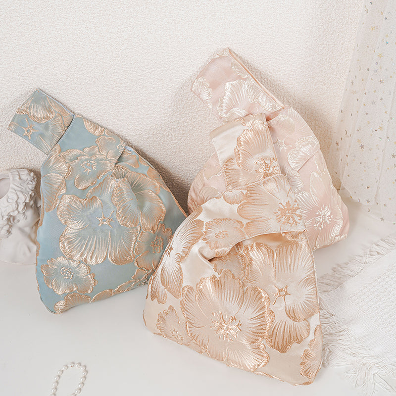 Embossed Camellia Satin Japanese Knot Bag