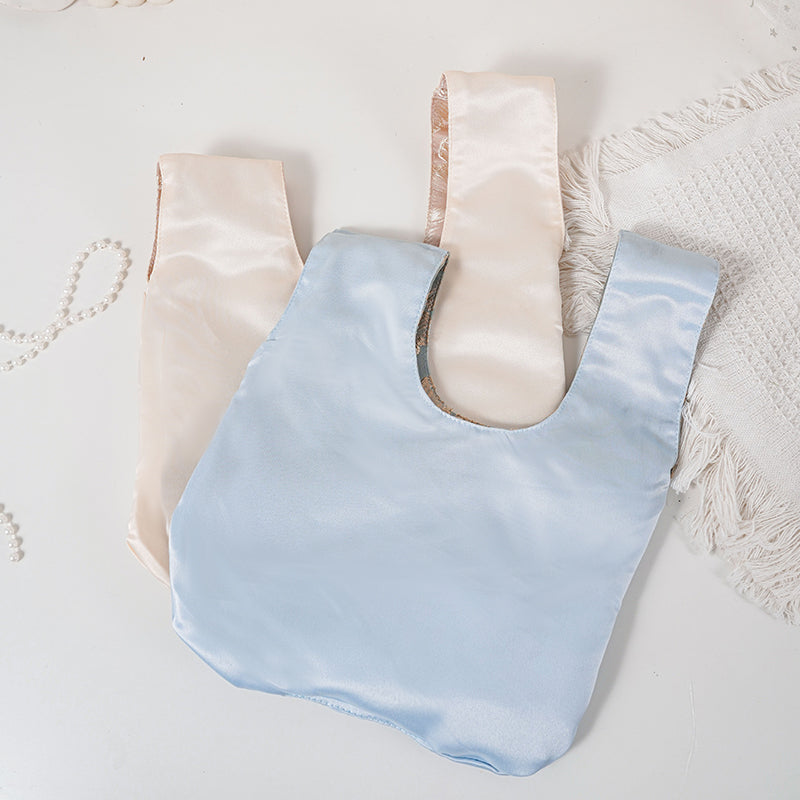 Embossed Camellia Satin Japanese Knot Bag