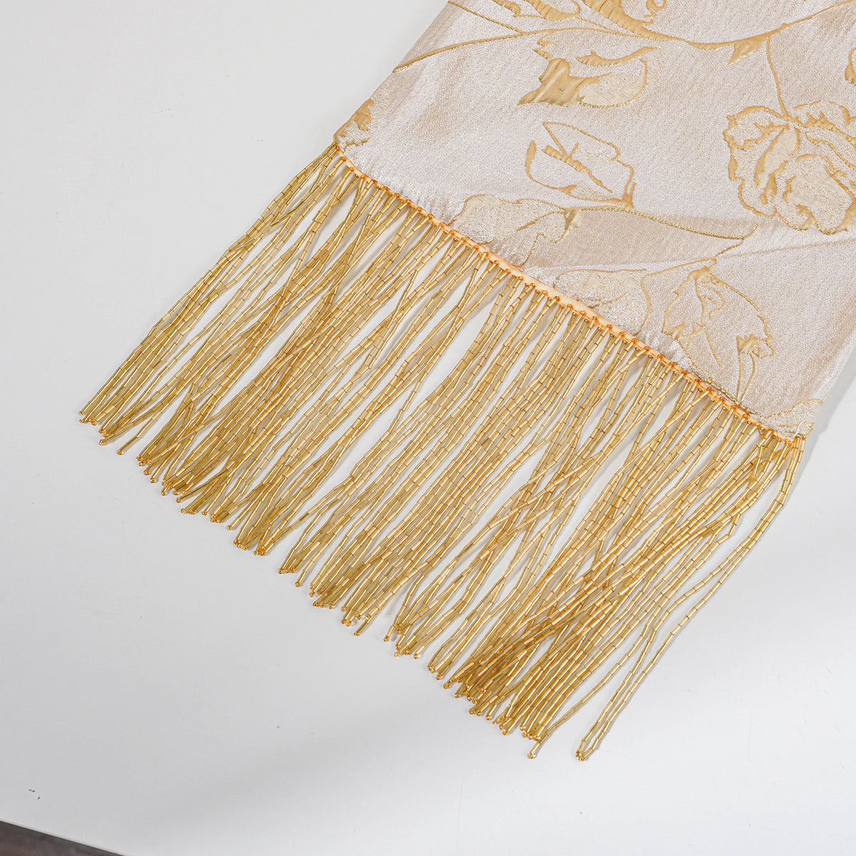 Gold yellow rose tassel bag detail