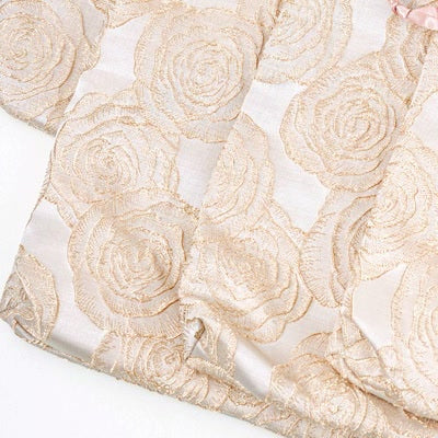 Close-up of embossed roses on champagne