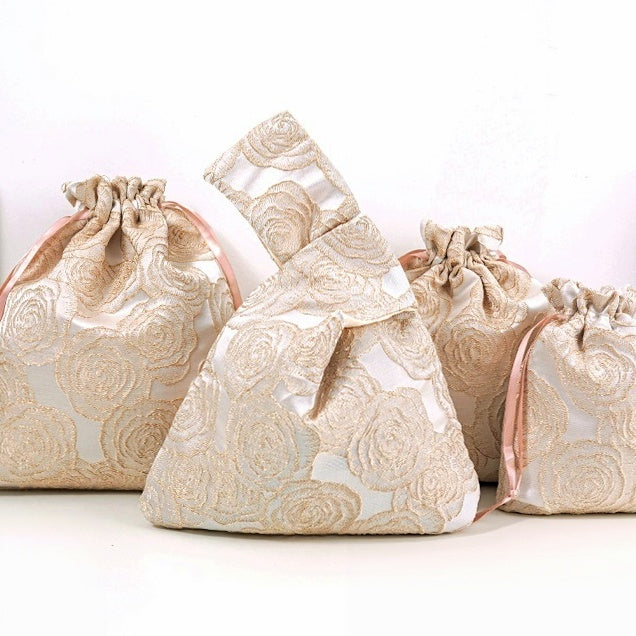Champagne baroque rose knot bag with matching gift bags, sold separately