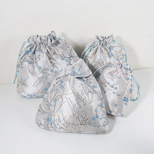 Blue winter blossom knot bag with matching gift bags, sold separately