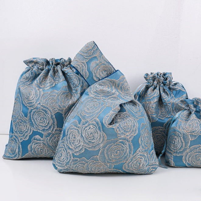 Navy baroque rose knot bag with matching gift bags, sold separately
