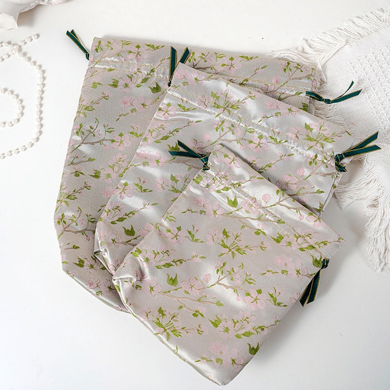 Champagne Sakura patterned drawstring favor gift bag