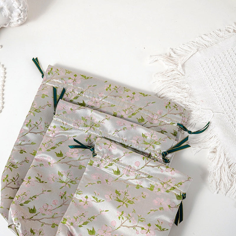 Champagne Sakura patterned drawstring favor gift bag