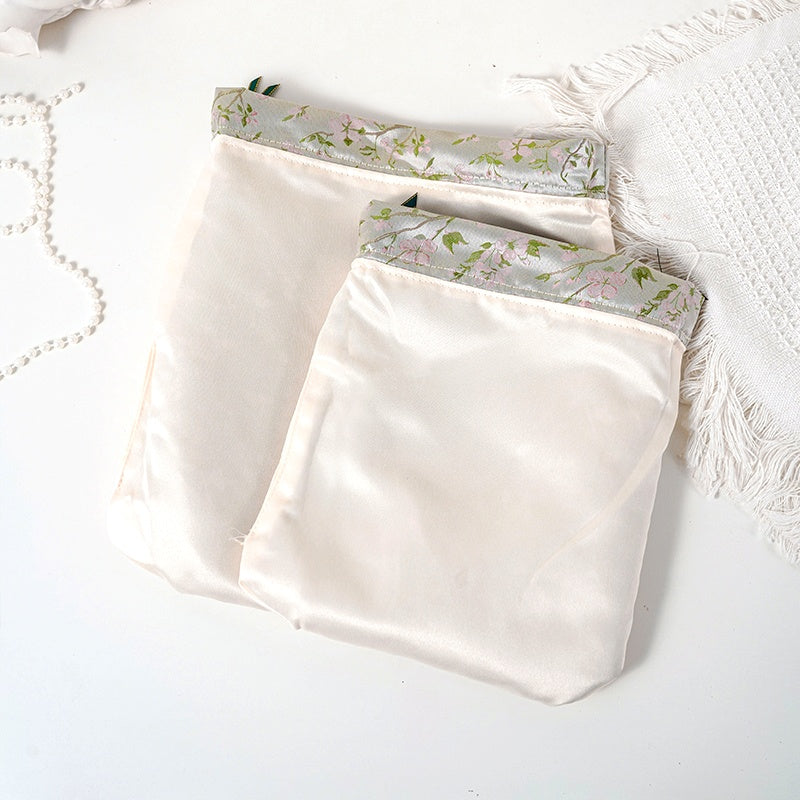 Champagne Sakura patterned drawstring favor gift bag