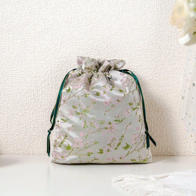 Champagne Sakura patterned drawstring favor gift bag