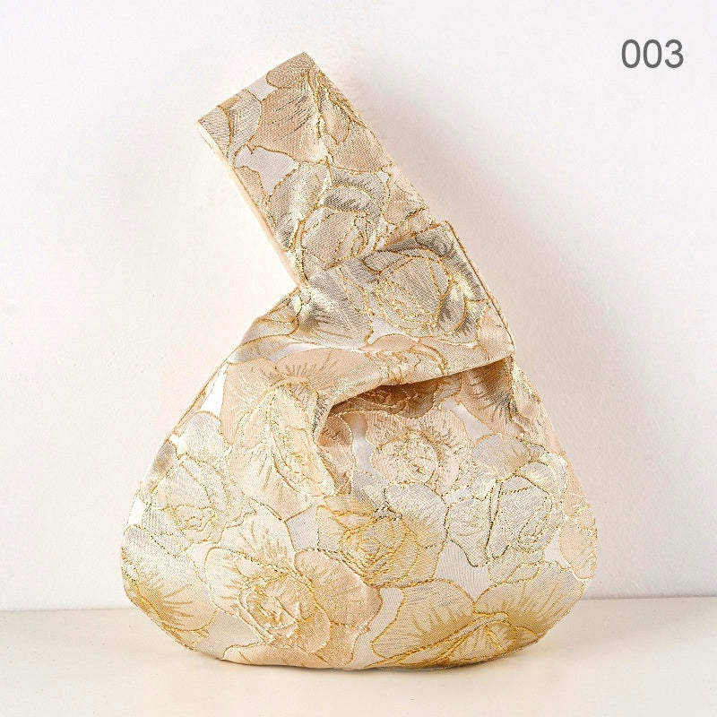 003 Gold Grand Rose Japanese knot wrist bag