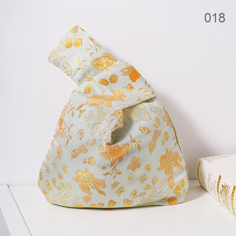 018 Green Goldfish Japanese knot wrist bag