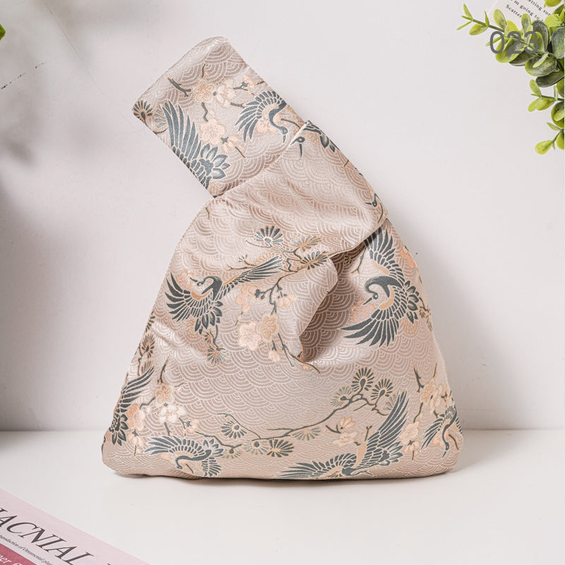 023 Champagne Crane Japanese knot wrist bag