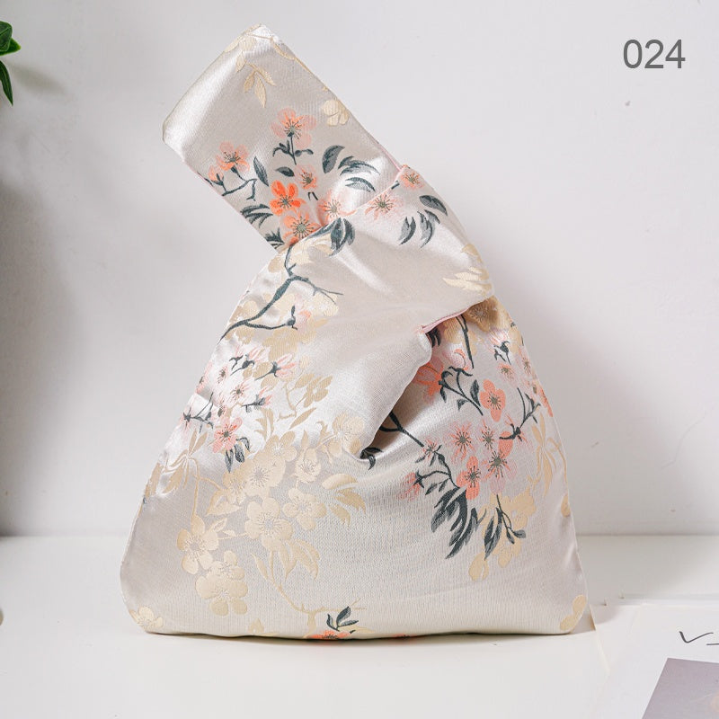 024 Champagne Blossom Japanese knot wrist bag