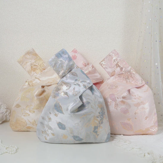 Metallic floral knot bag color options; each bag sold individually