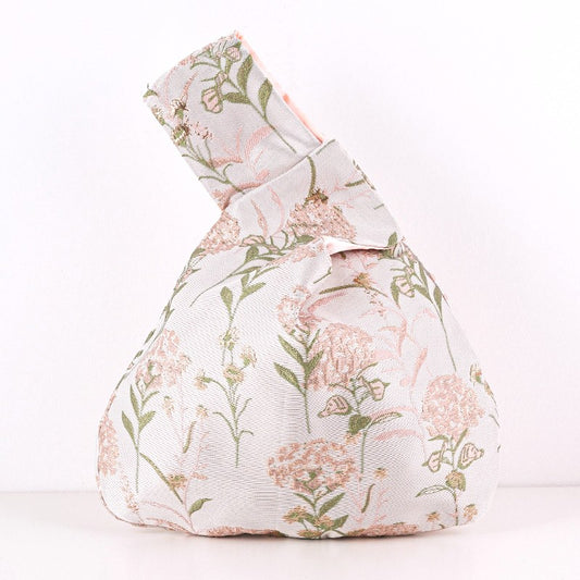 Pink hydrangea satin knot bag with raised metallic blooms