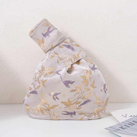 Champagne Swallow Japanese knot bag, front view