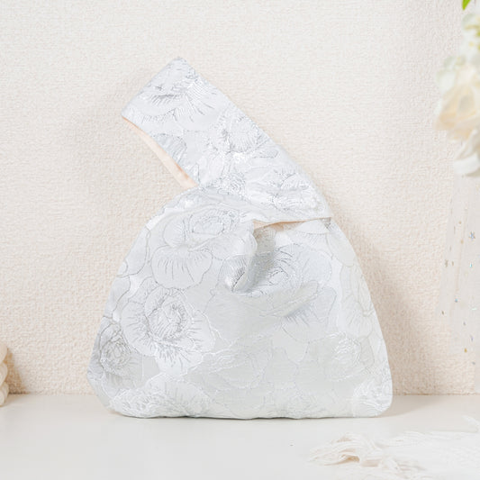 Silver rose satin knot bag with silver-line jacquard